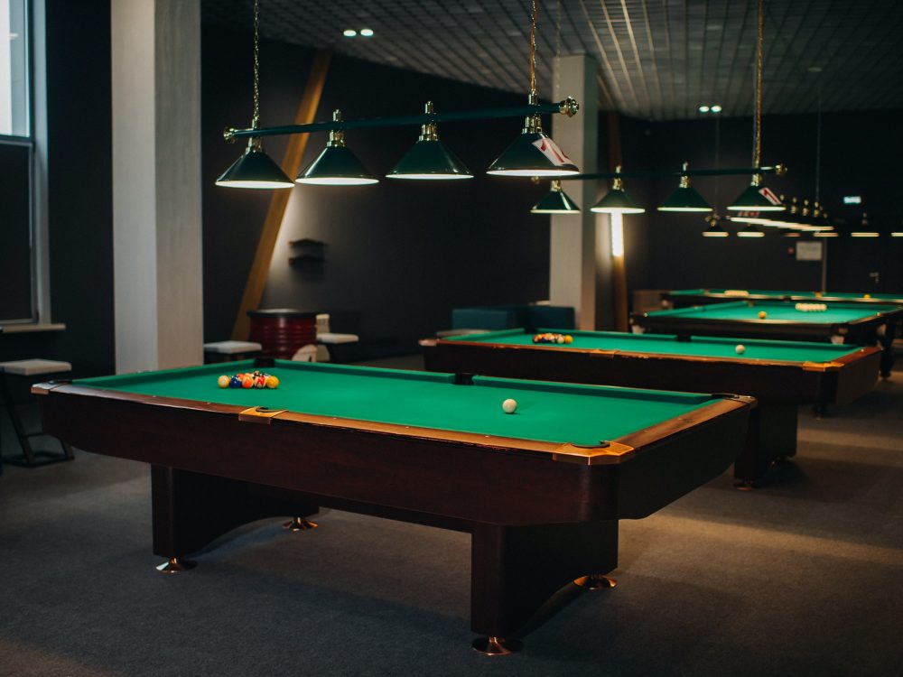 billiard-table-with-green-surface-and-balls-in-the-billiard-club-pool-game-5.jpg